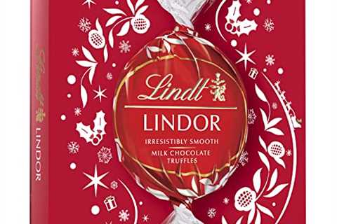 Lindt LINDOR Holiday Milk Chocolate Truffles Modern Gift Box, Milk Chocolate Candy with Smooth,..