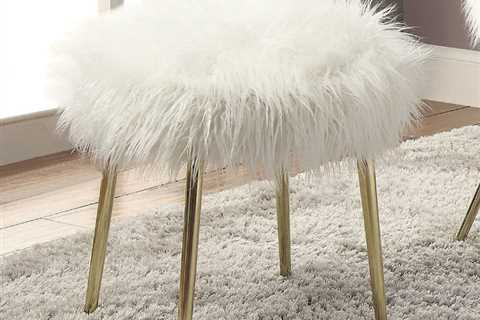 CM-AC6546-OT Caoimhe white fur like fabric upholstered ottoman with gold legs. Click Acima Leasing..