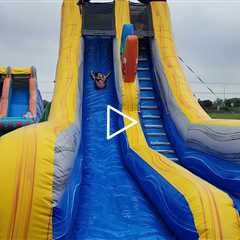 Make a Splash with the 18ft Big Splash Tropical Water Slide! - Jumpin Joy Party Rentals